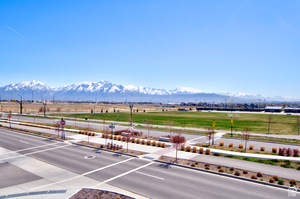 Property view of mountains with a rural view