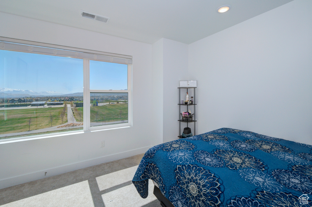 Bedroom with recessed lighting, visible vents, carpet flooring, and baseboards