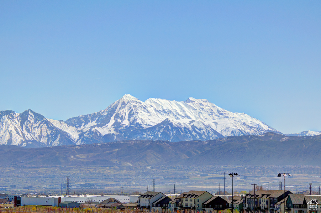Property view of mountains featuring a residential view
