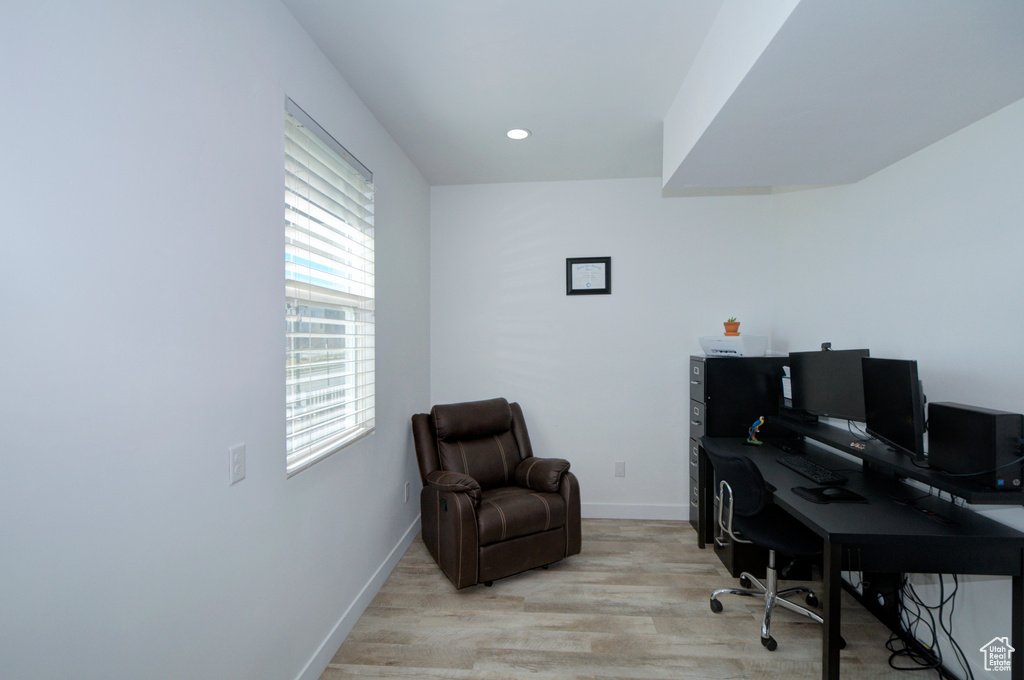 Office with recessed lighting, light wood-style flooring, and baseboards