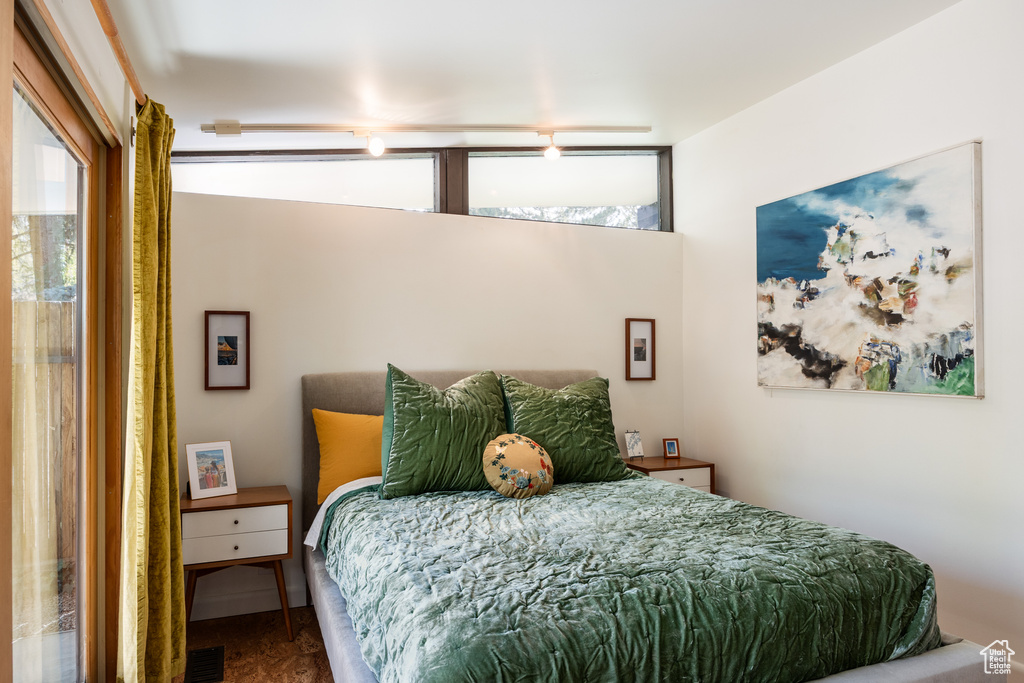 Bedroom featuring visible vents