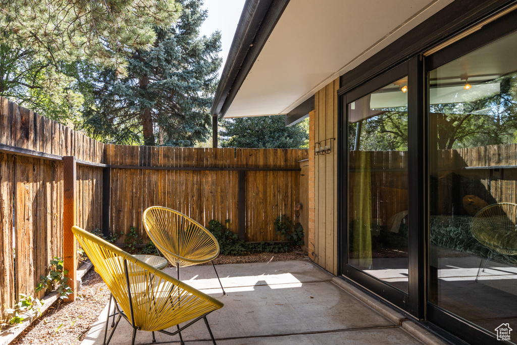 View of patio / terrace featuring fence