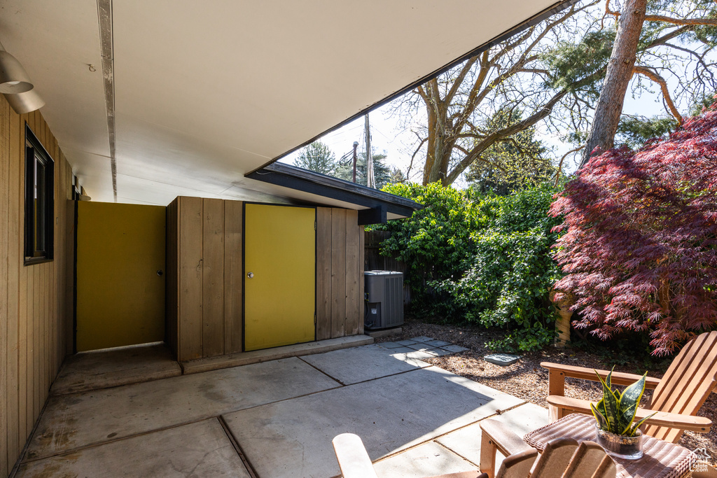 View of patio with cooling unit