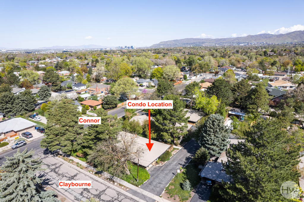 Aerial view featuring a residential view and a mountain view