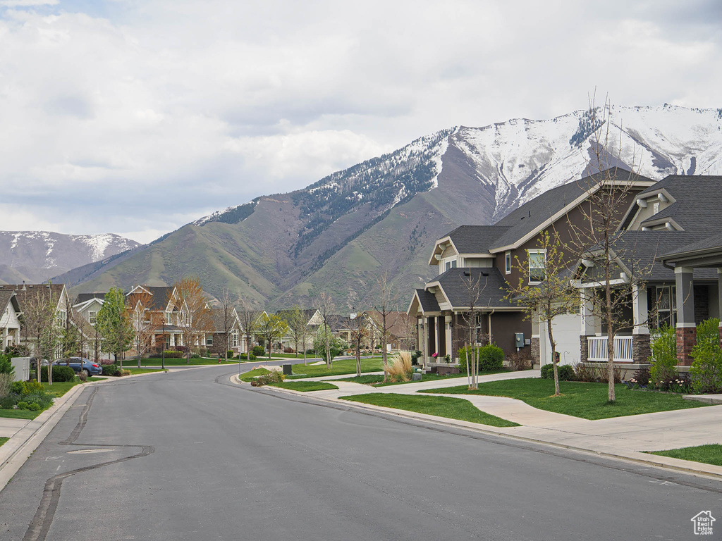 Property view of mountains featuring a residential view