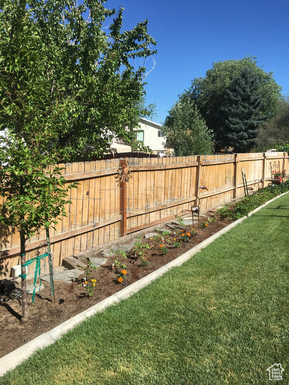 View of yard with a garden