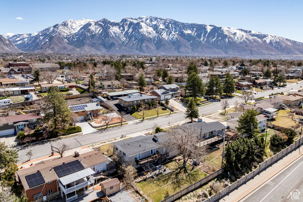 Aerial view of residential area with a mountainous background