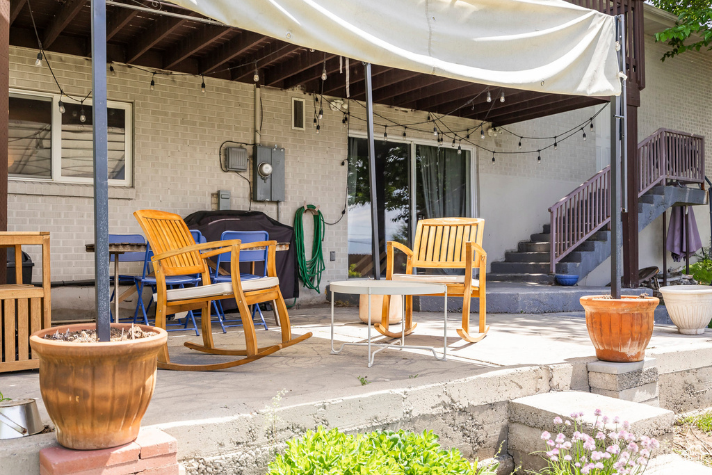 View of patio with stairs