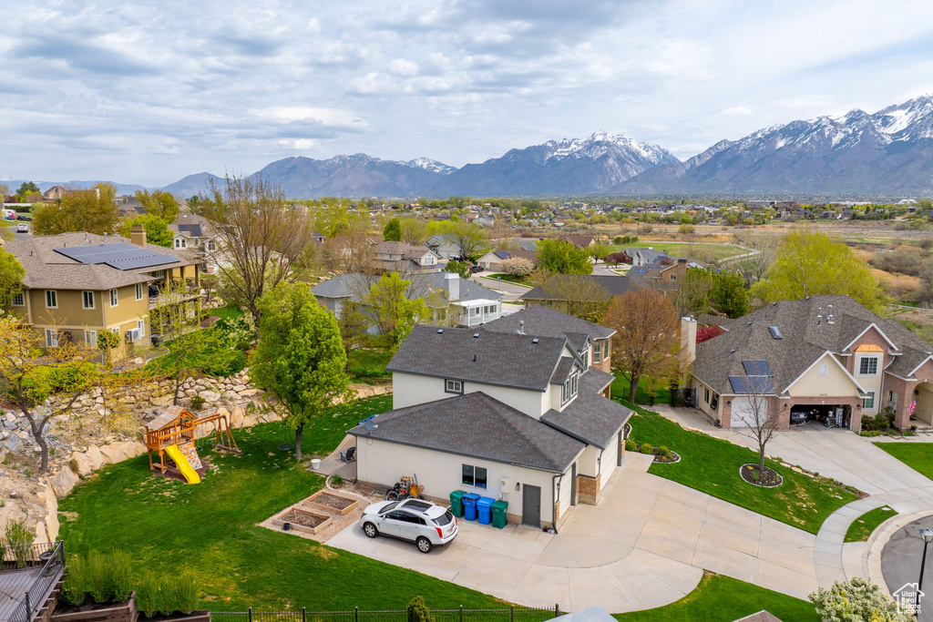 Birds eye view of property featuring a residential view and a mountain view