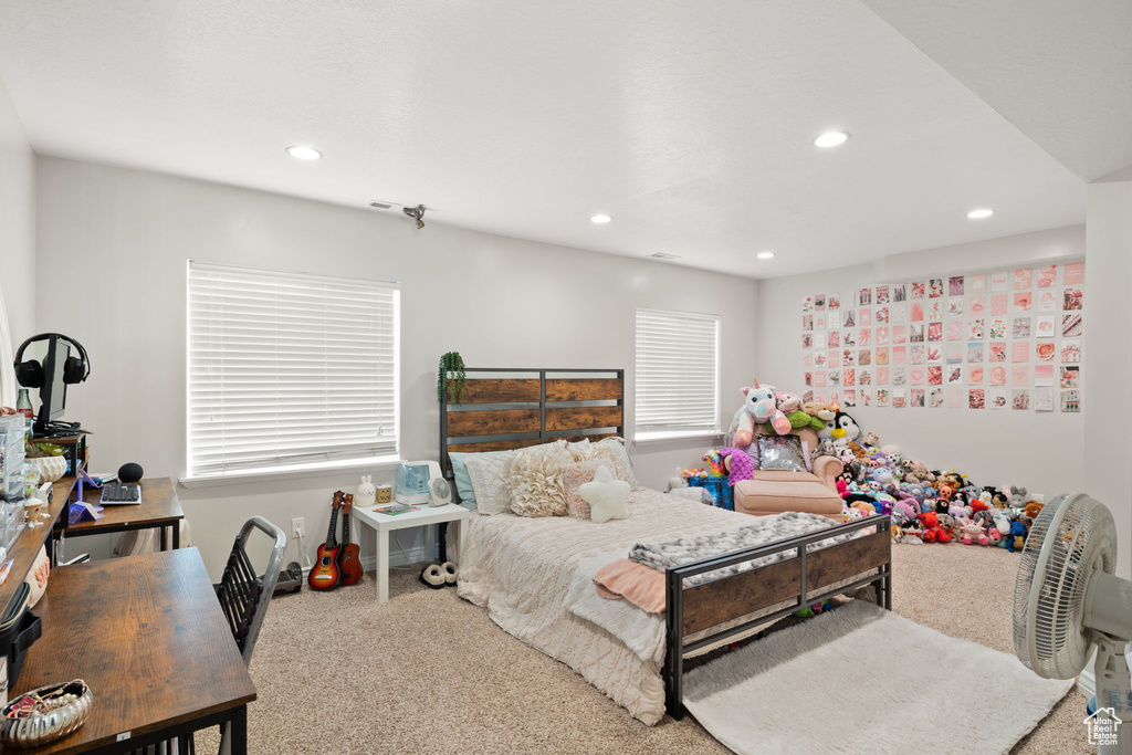 Carpeted bedroom featuring recessed lighting