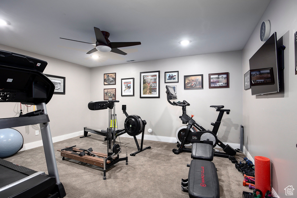 Exercise room with a ceiling fan, baseboards, carpet, and recessed lighting