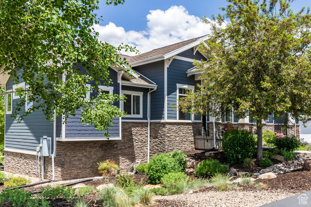 View of front of property featuring stone siding