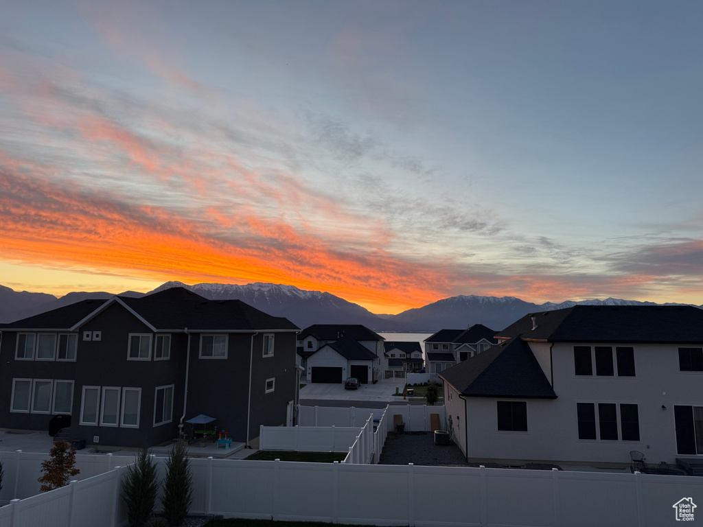View of mountain backdrop with nearby suburban area