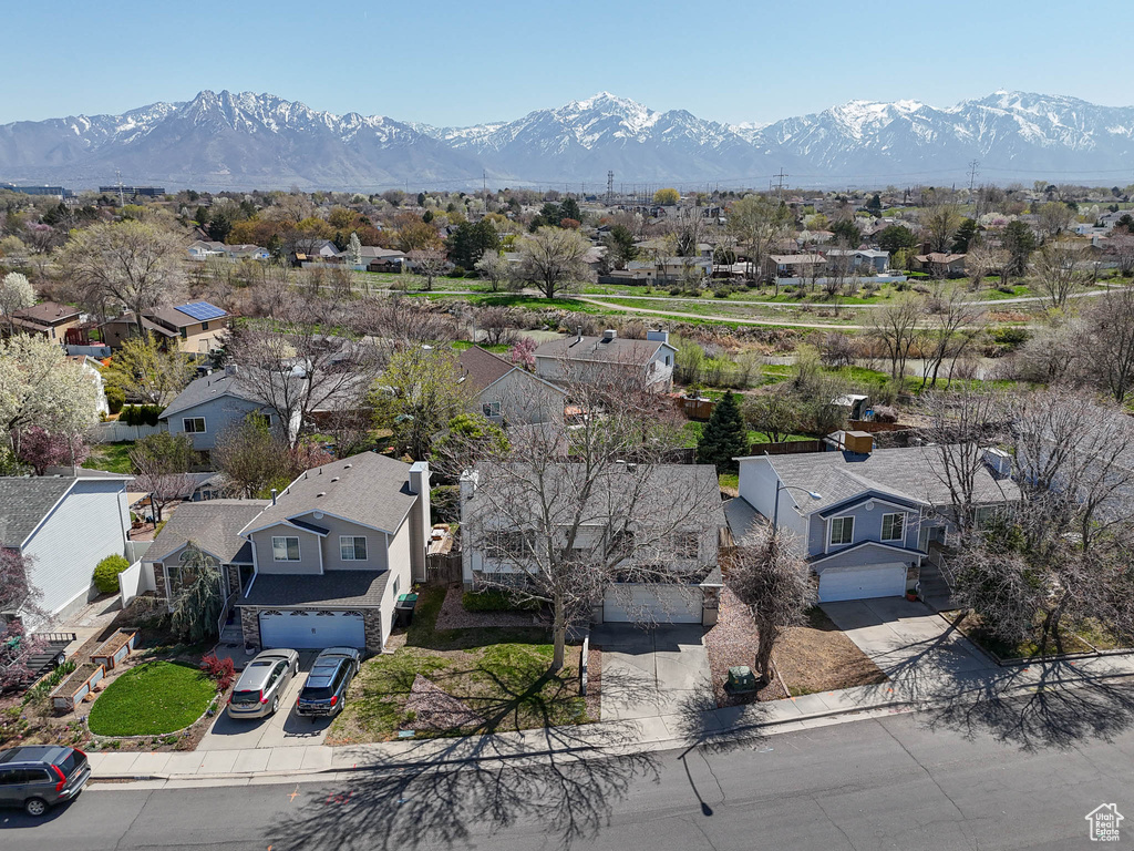 Drone / aerial view with a mountain view and a residential view