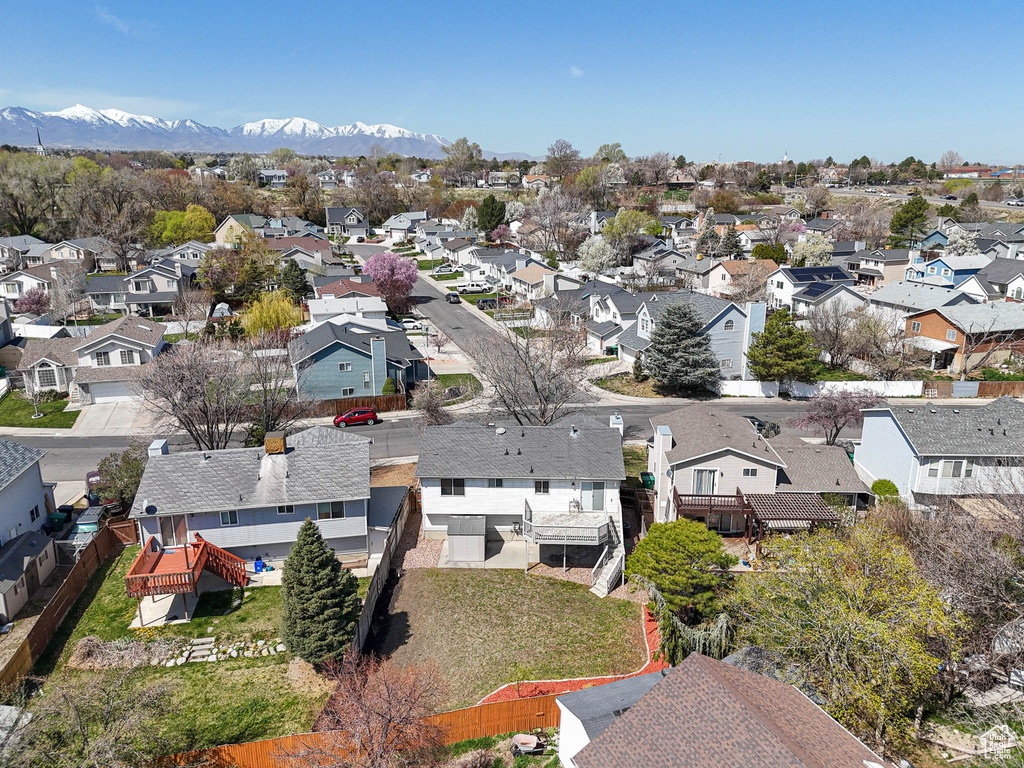 Drone / aerial view with a mountain view and a residential view