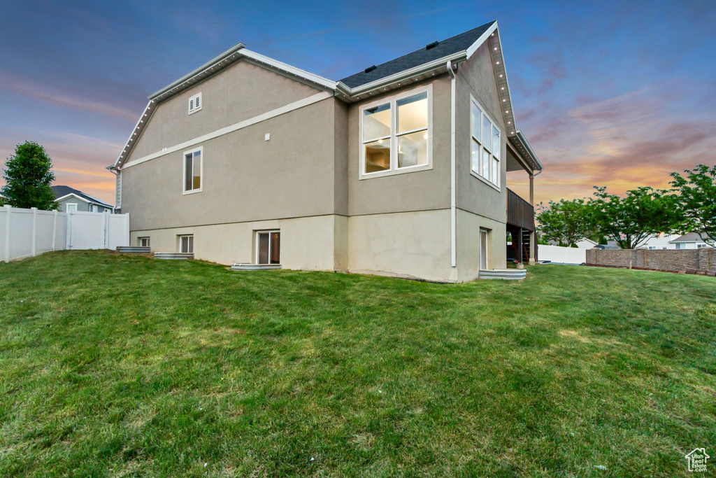 Back of property with stucco siding