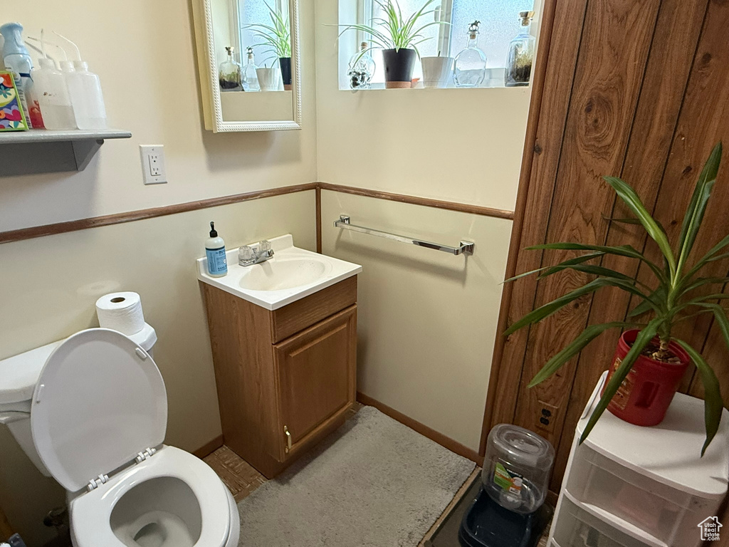 Bathroom featuring toilet and vanity