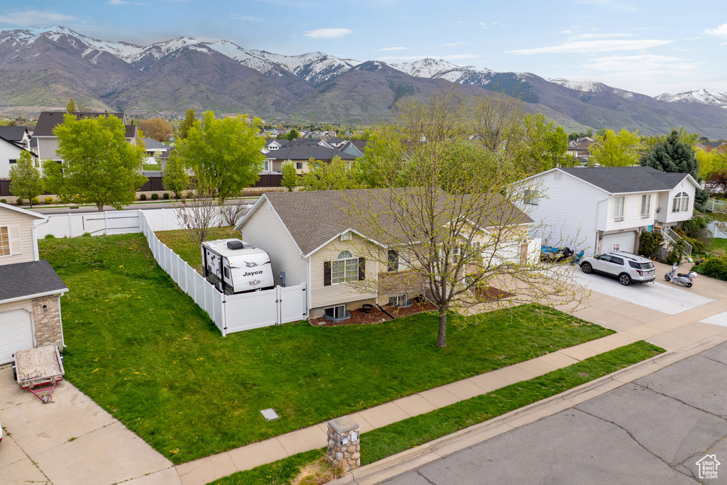 Birds eye view of property with a residential view and a mountain view