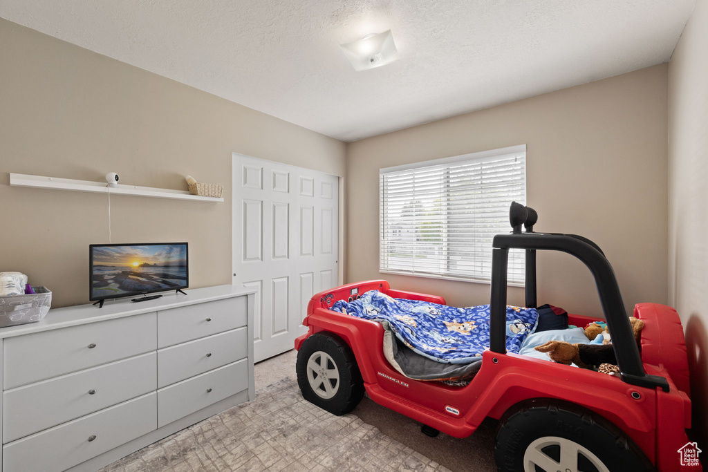 Bedroom featuring carpet floors