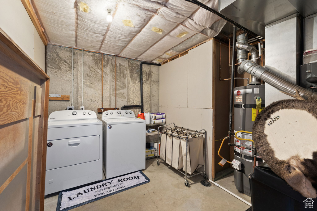 Washroom with secured water heater, separate washer and dryer, and laundry area