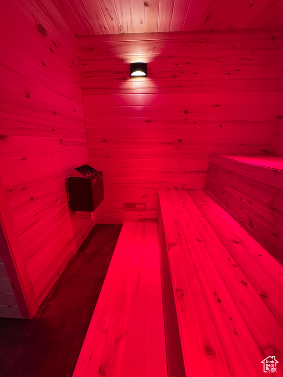 Relaxing sauna / steam room with wooden ceiling and wood walls