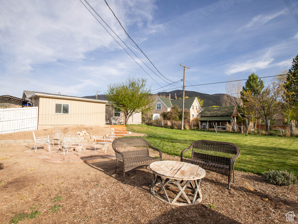 View of yard featuring fence