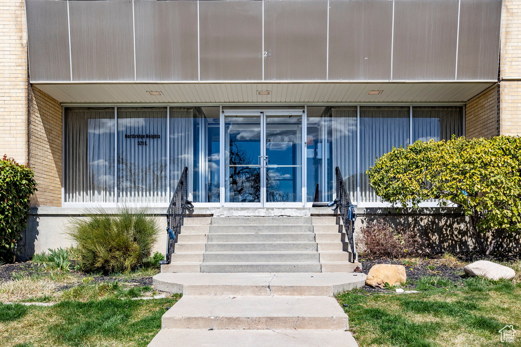 Property entrance with brick siding