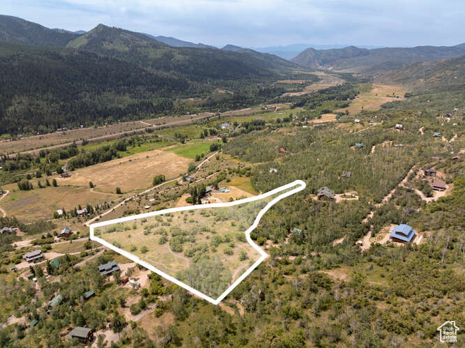 Bird's eye view with a rural view and a mountain view