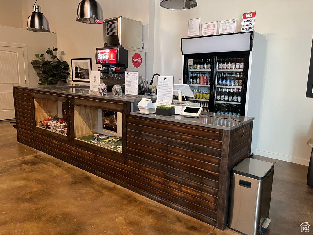 Bar featuring finished concrete floors