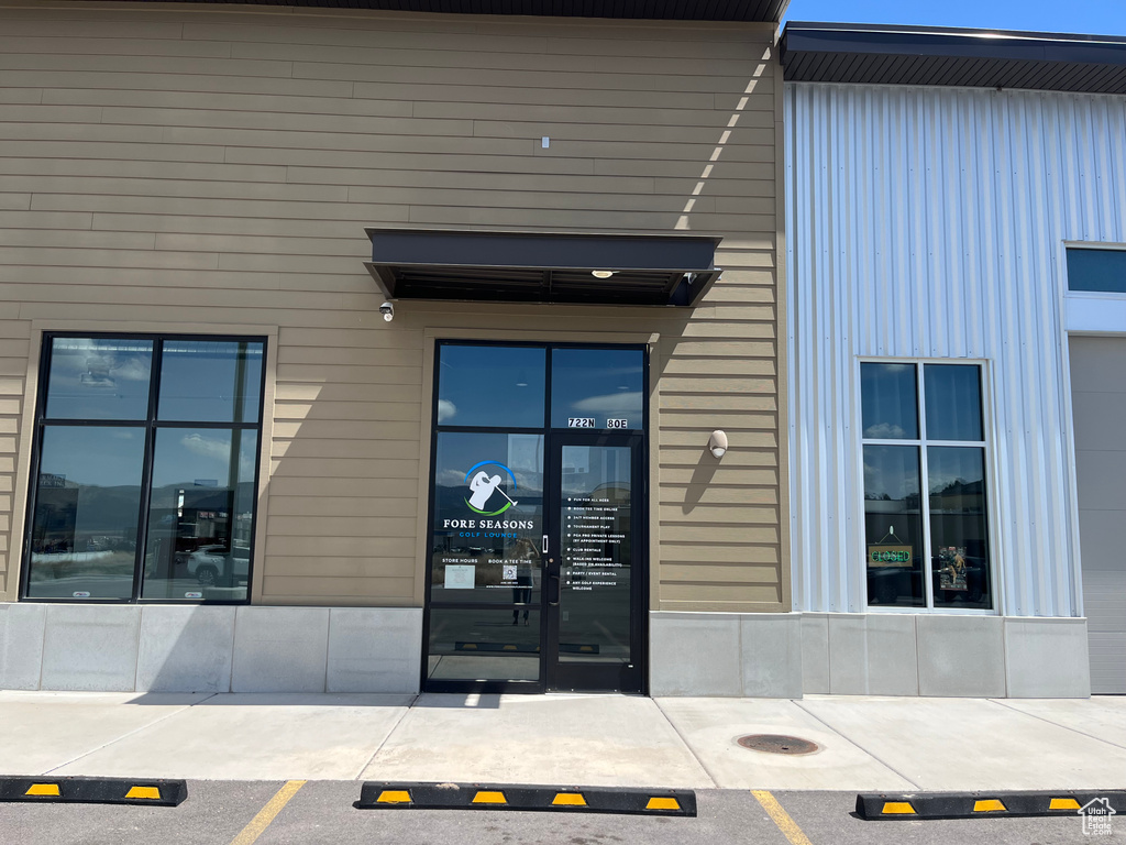 Property entrance with uncovered parking