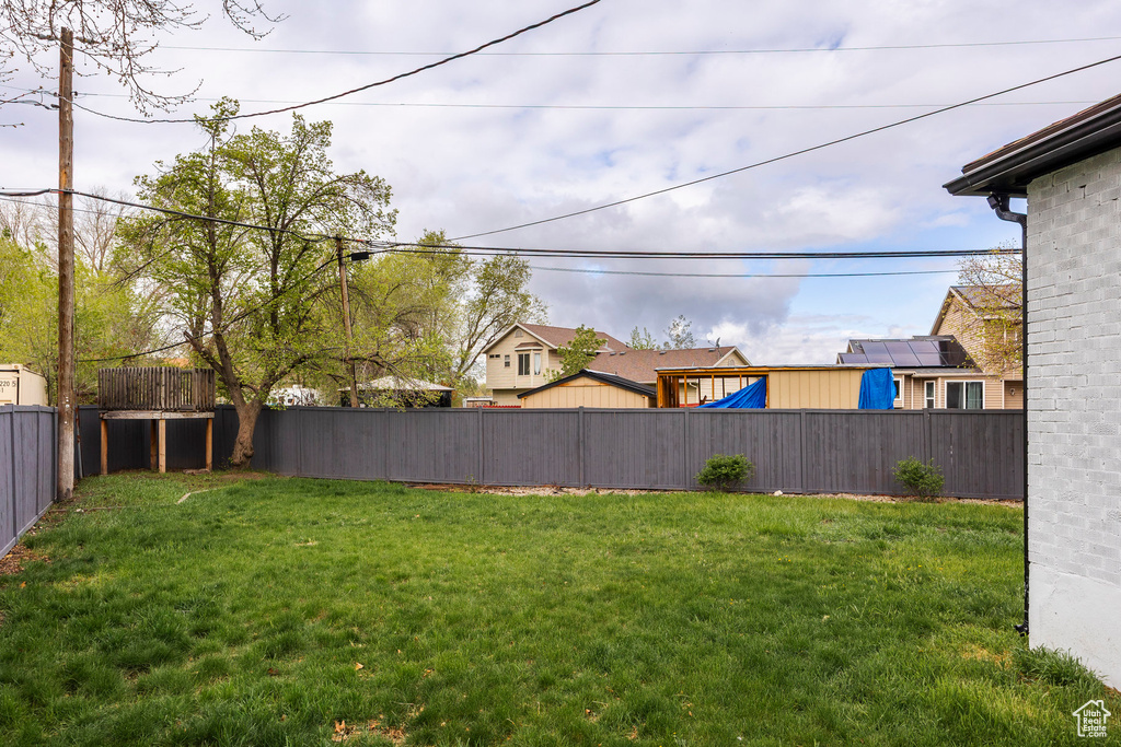 View of fenced backyard