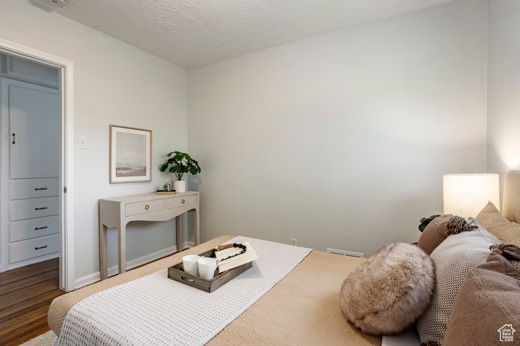 Bedroom featuring wood finished floors
