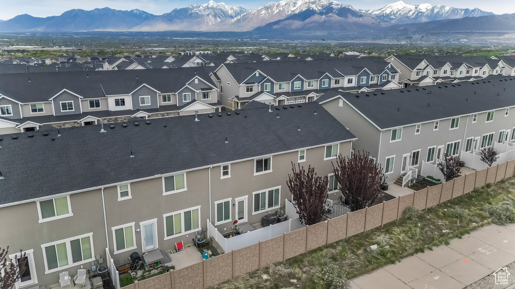 Aerial view featuring a mountain view and a residential view