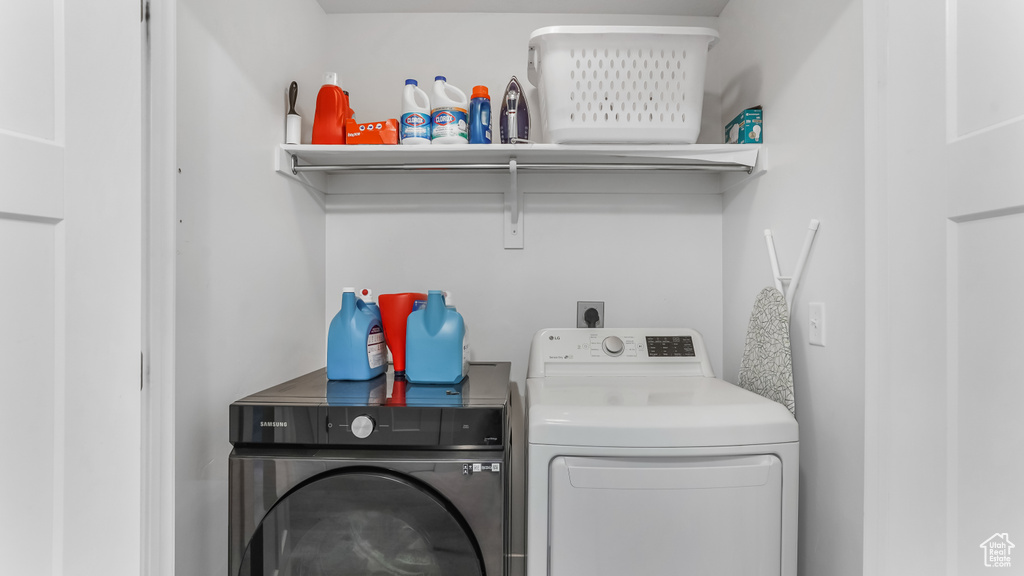 Clothes washing area with washing machine and clothes dryer and laundry area