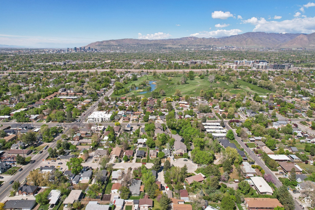 Drone / aerial view with a residential view and a water and mountain view