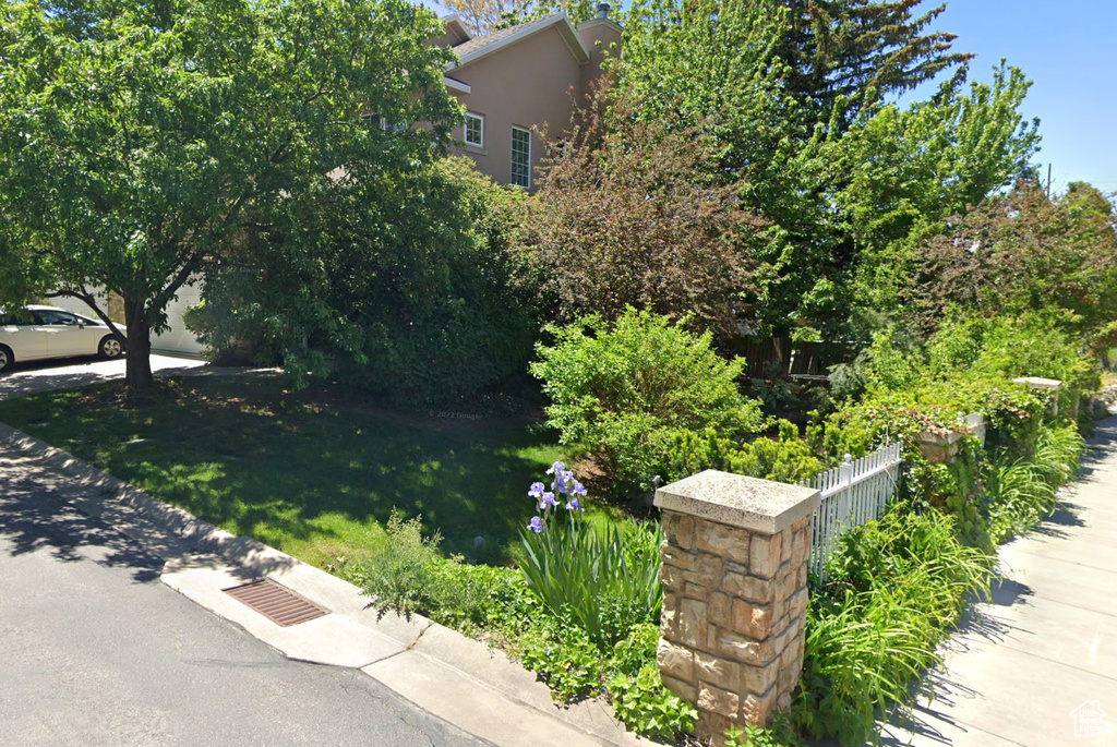 View of side of home with a chimney