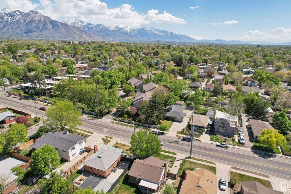 Birds eye view of property featuring a residential view and a mountain view