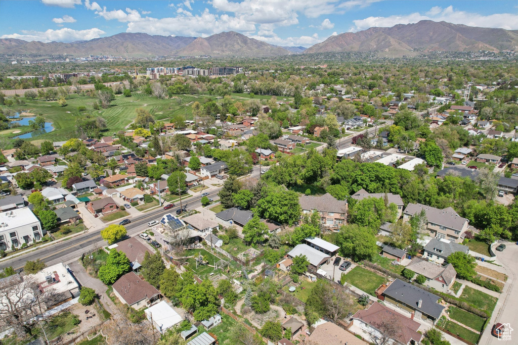Bird\'s eye view with a residential view and a water and mountain view