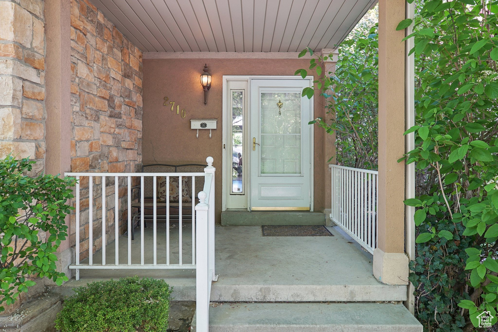 Property entrance with a porch