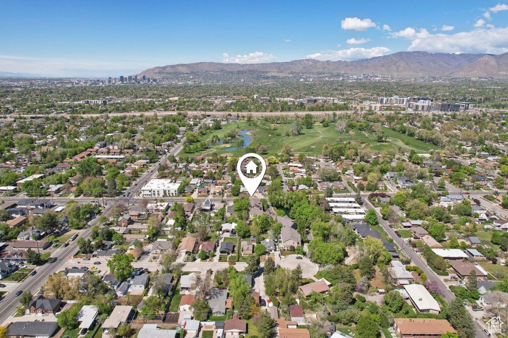 Birds eye view of property with a residential view and a water and mountain view