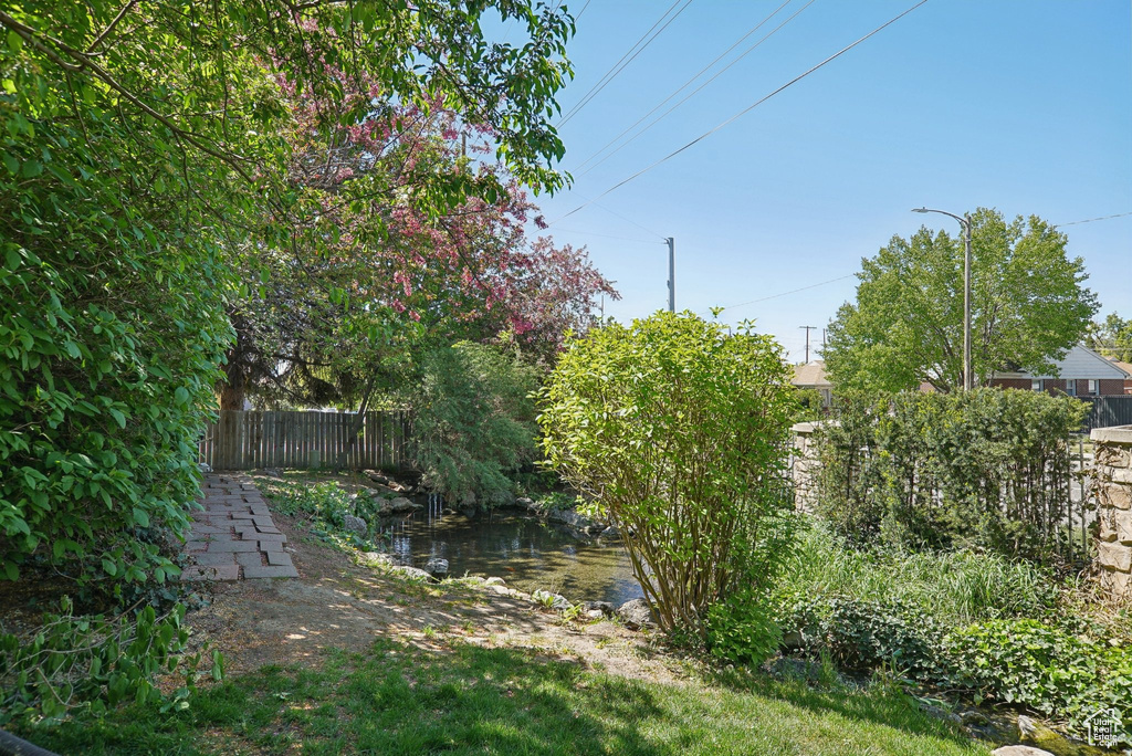 View of yard with fence