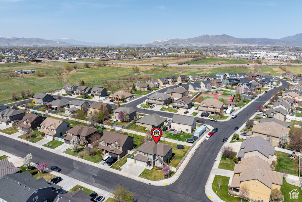 Aerial view featuring a mountain view and a residential view