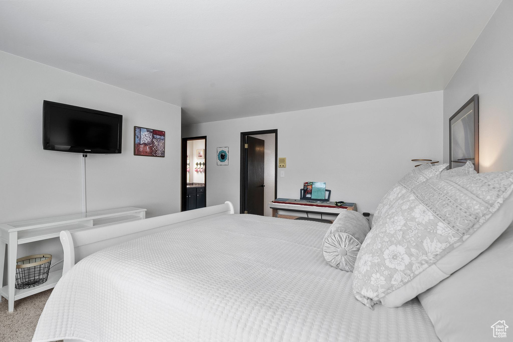 Bedroom featuring carpet