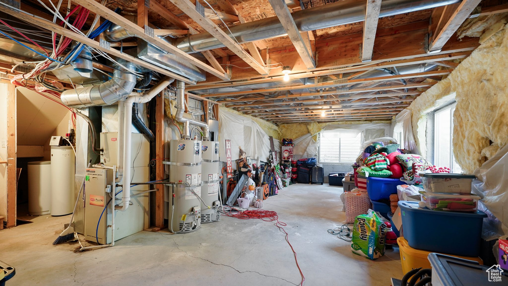 Below grade area with water heater and heating unit