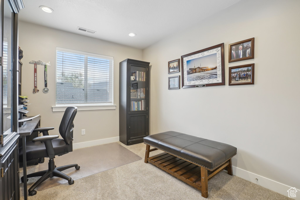 Home office featuring baseboards, visible vents, carpet floors, and recessed lighting
