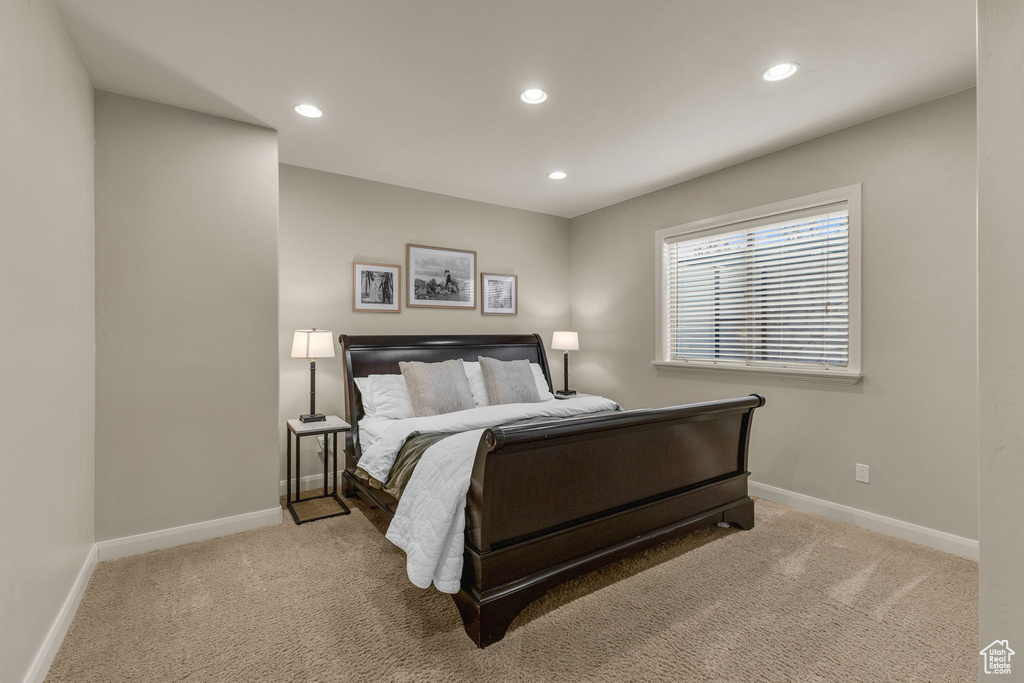Bedroom with recessed lighting, carpet, and baseboards