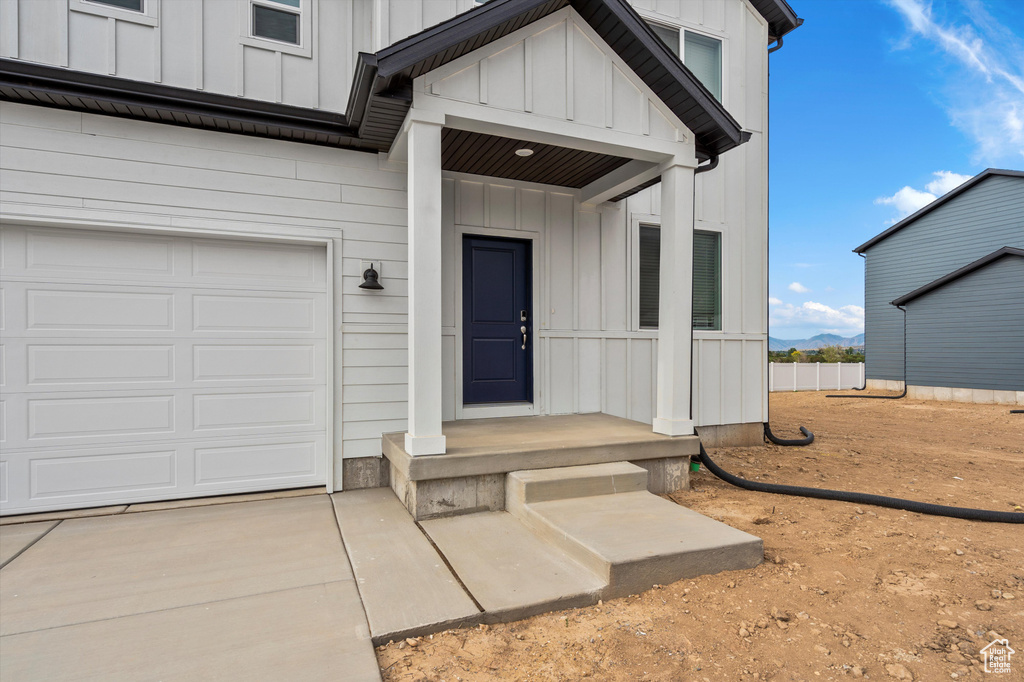 Entrance to property with board and batten siding