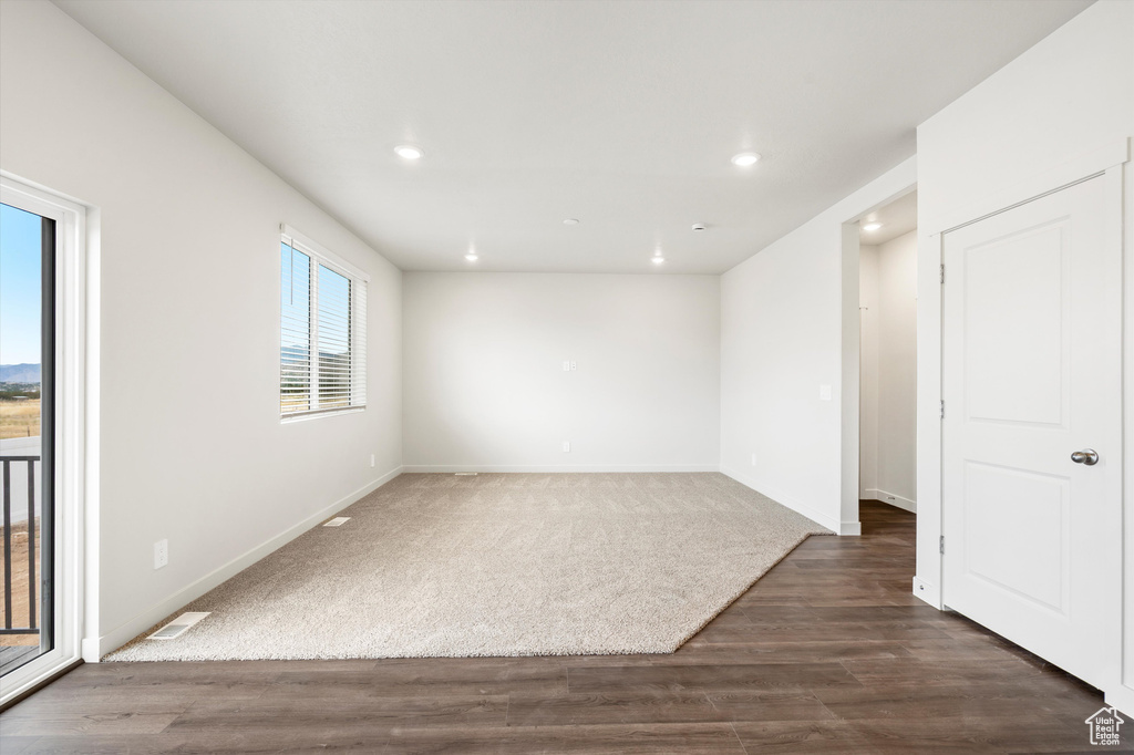 Unfurnished room featuring recessed lighting and wood finished floors
