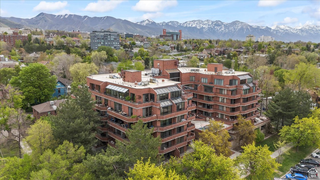 View of property with a mountain view