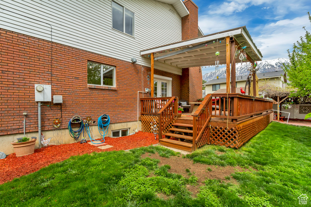 Exterior space featuring a yard